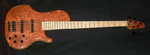 The Base Pommele-Bubinga Top, Maple Fingerboard