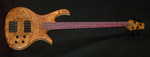 Jonas - Top: Maple Burl
Fingerboard: Amaranth