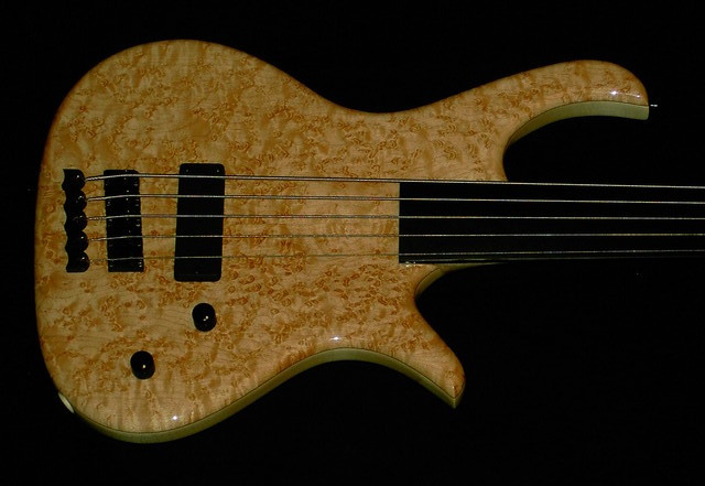 Jonas Fretless 
Birdseye Maple Top